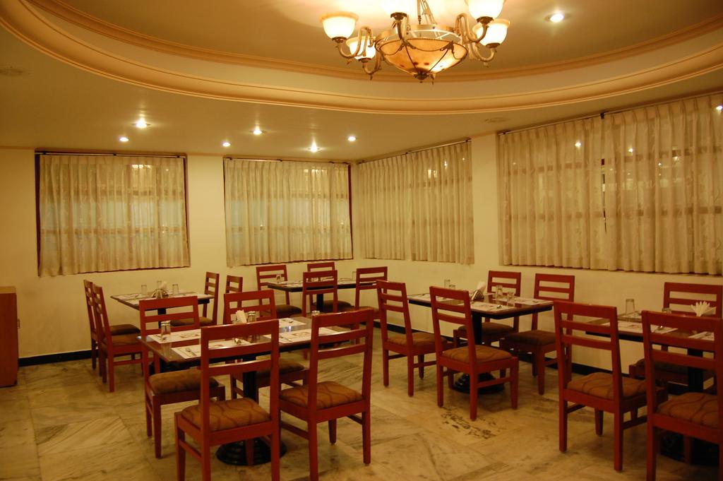Hotel Orange Blossom Tiruchirappalli Extérieur photo